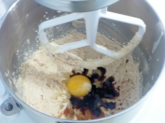 adding egg, vanilla liqueur