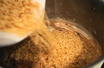 adding rice crispies