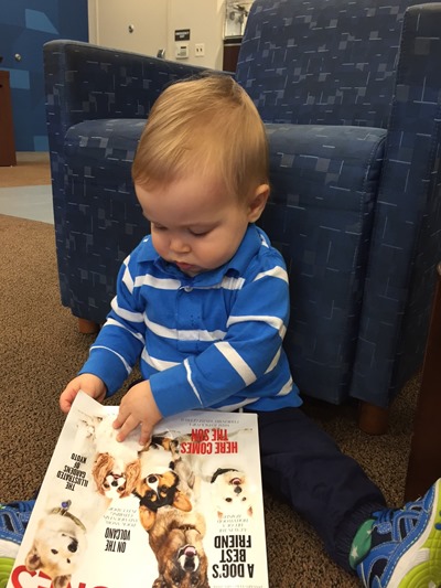 A magazine with dogs on the cover = only way to get toddler to sit still