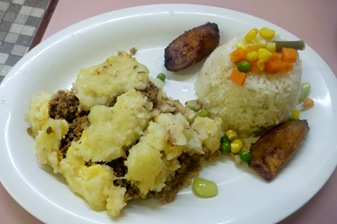 meat and potatoes with plantains and rice