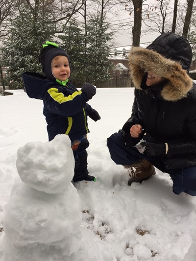 Toddler snowman building!